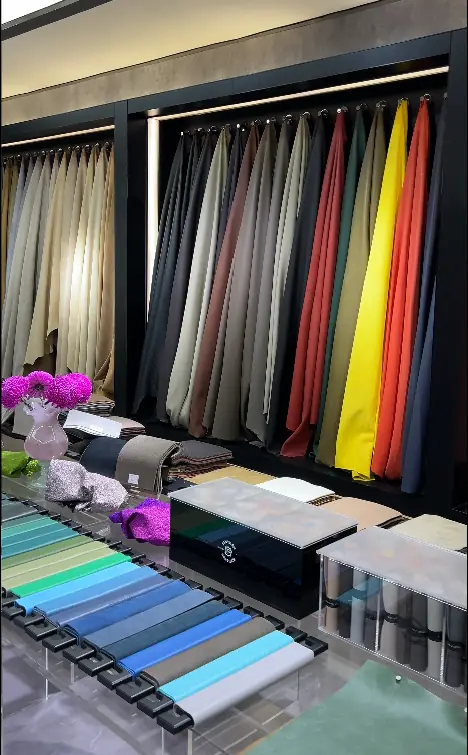Upholstery samples displayed by colour beside material swatches