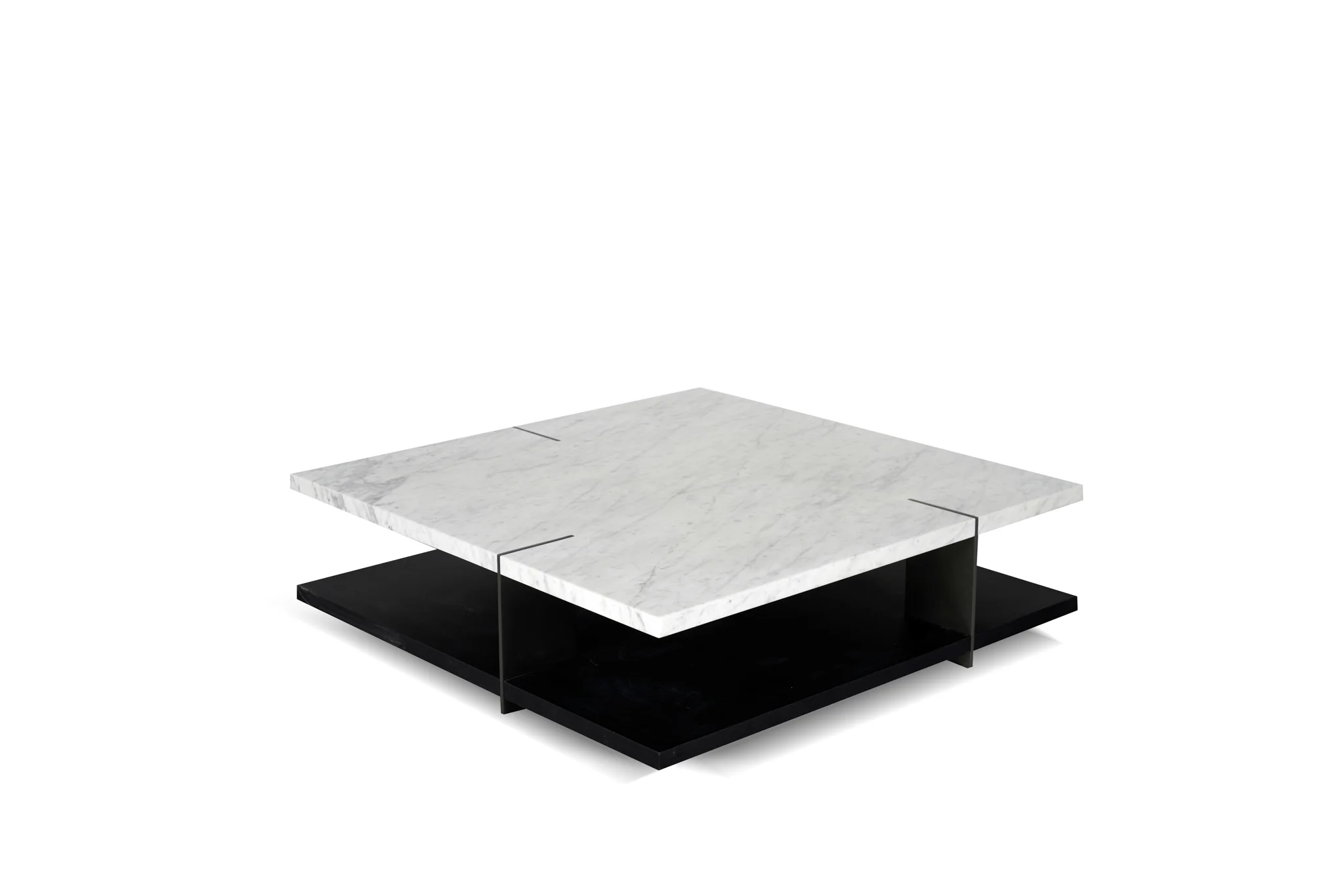 Low coffee table with overlapping pale surfaces and a dark open base