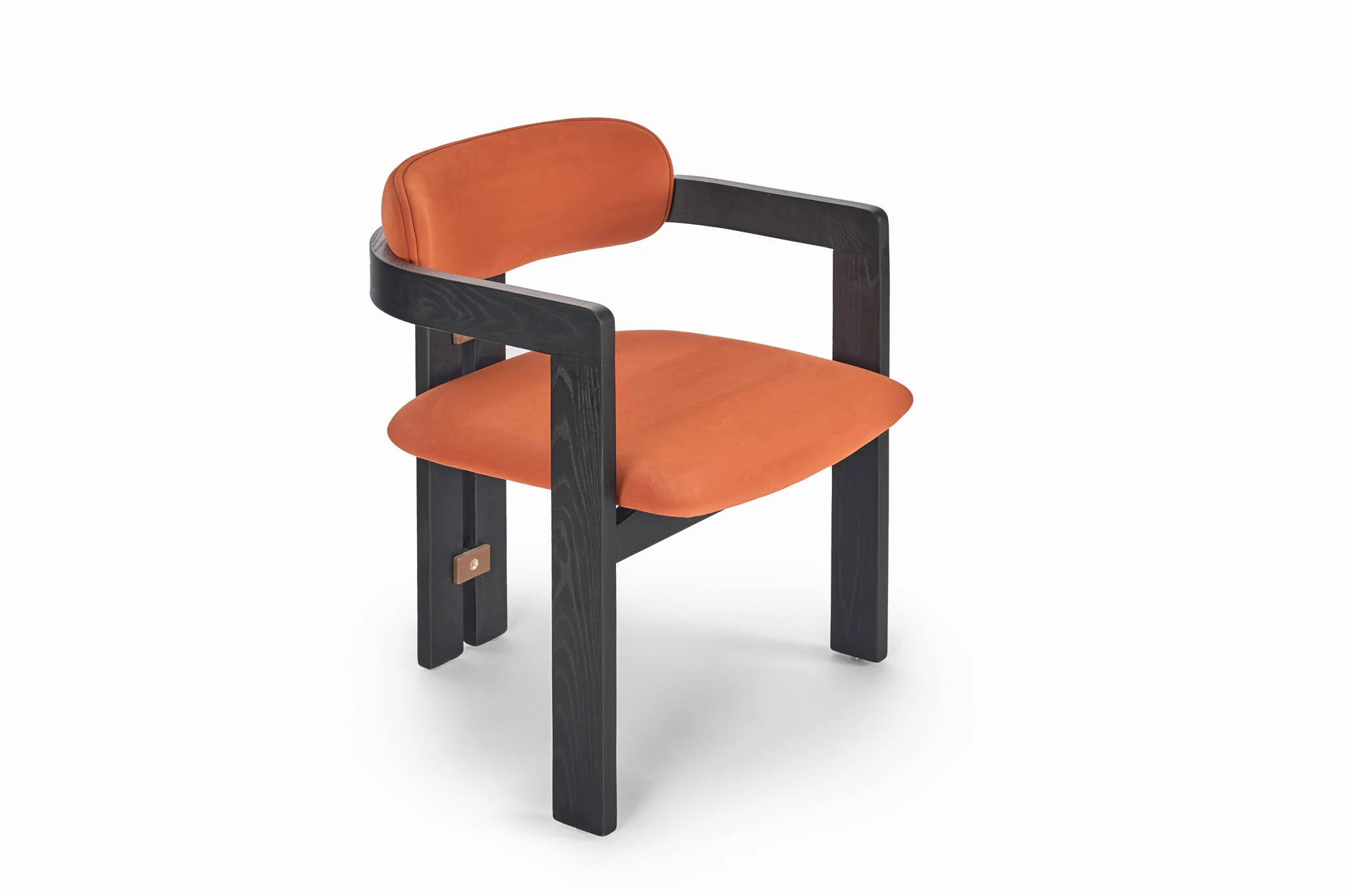 Dining chair with a colored upholstered seat and dark open frame