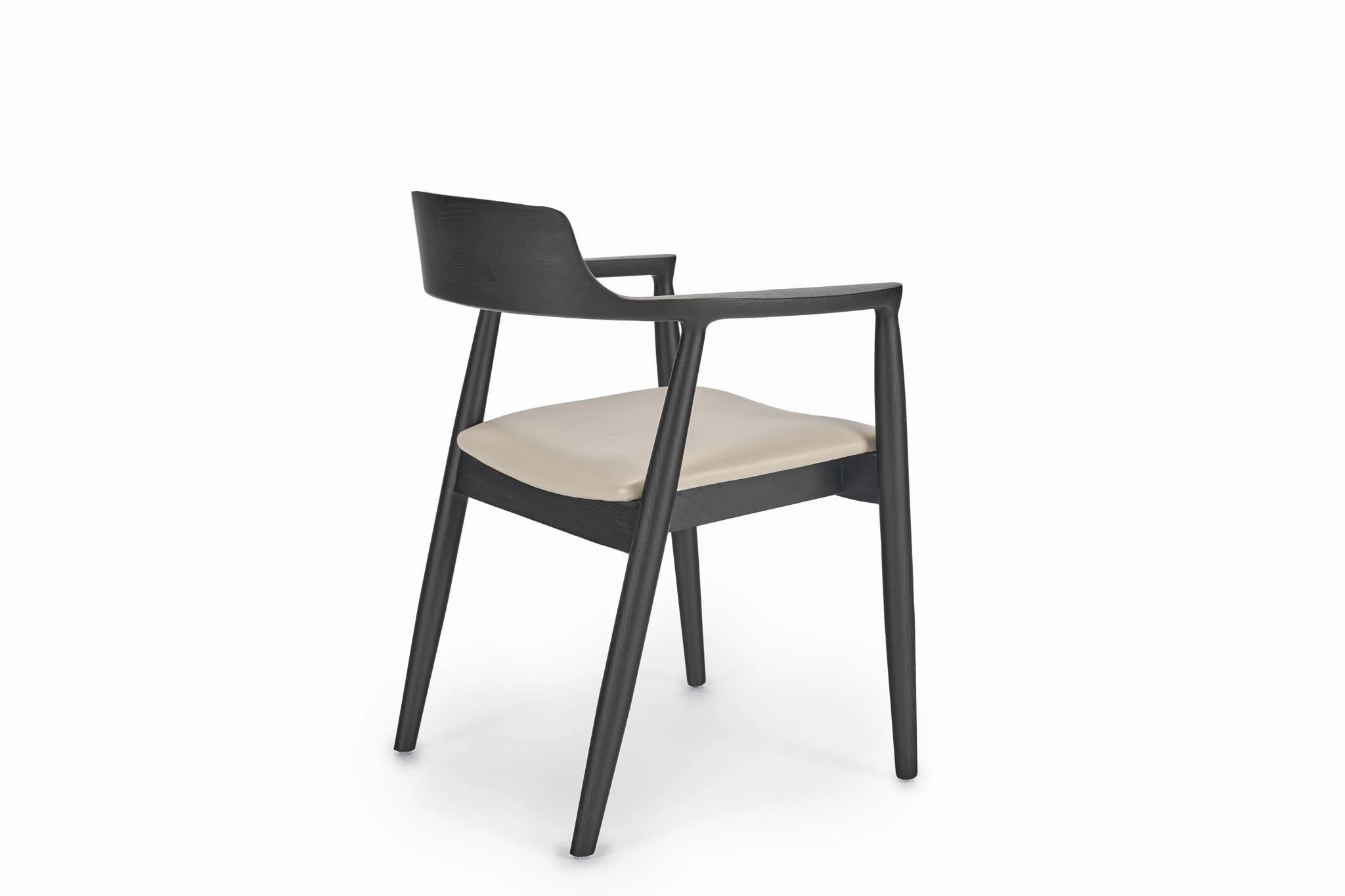 Side view of an upholstered dining chair with dark arms and angled back legs