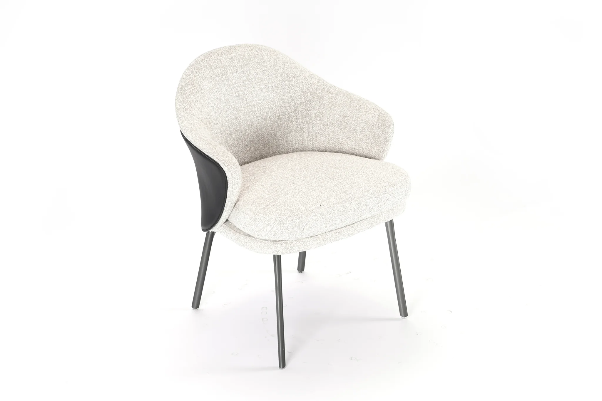 Upholstered dining chair with a curved wraparound back and slim metal legs
