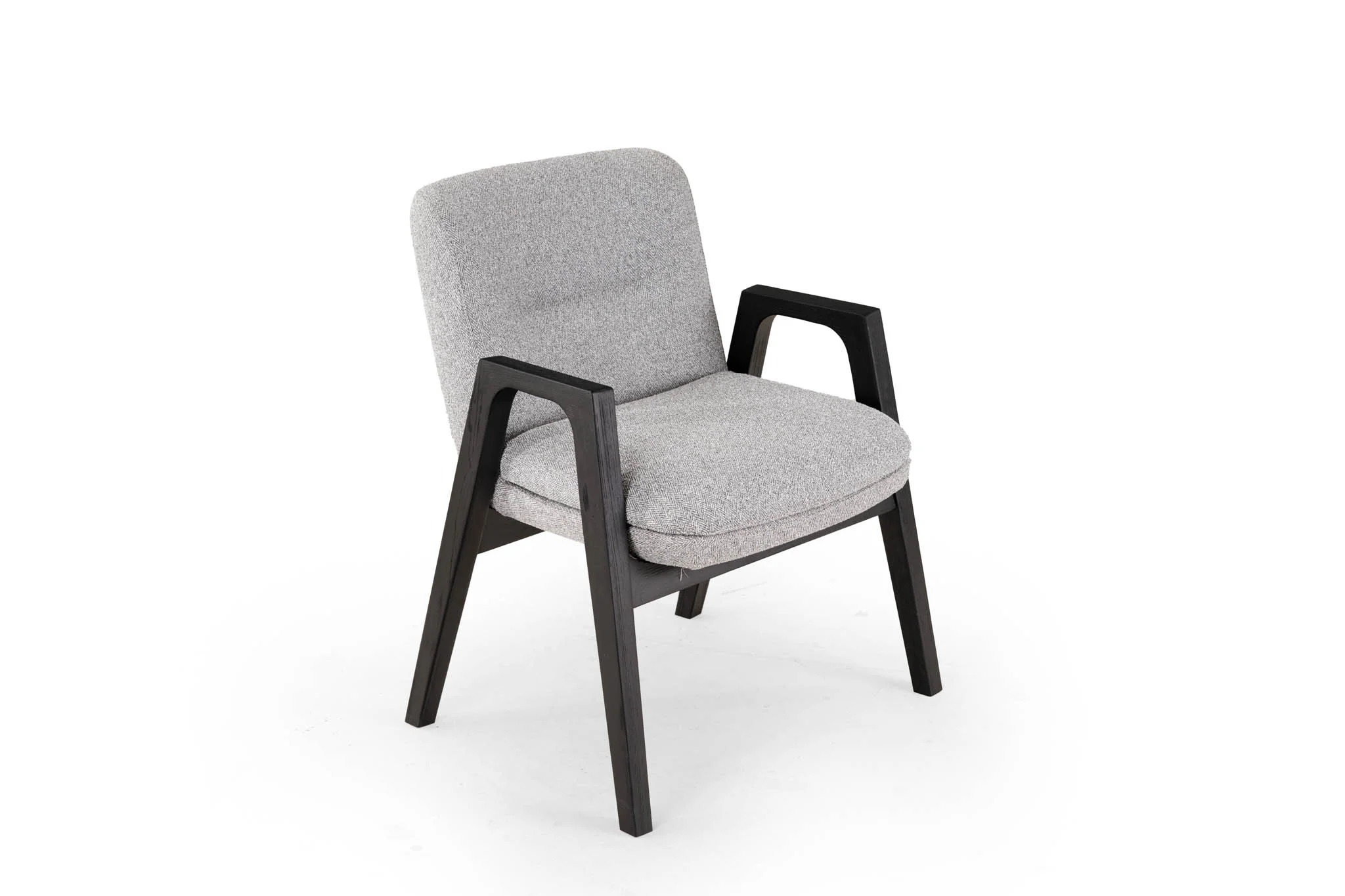 Curved upholstered lounge chair with a solid-wood frame