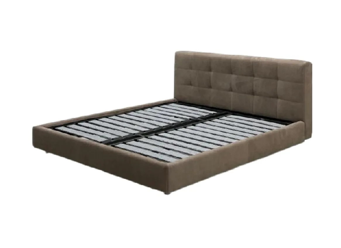 Upholstered bed with a rectangular tufted headboard and exposed support slats