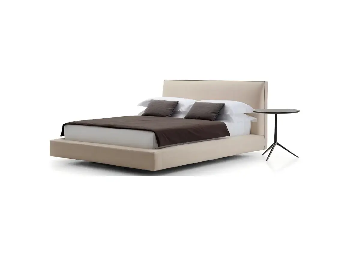 Beige upholstered platform bed with a smooth low headboard