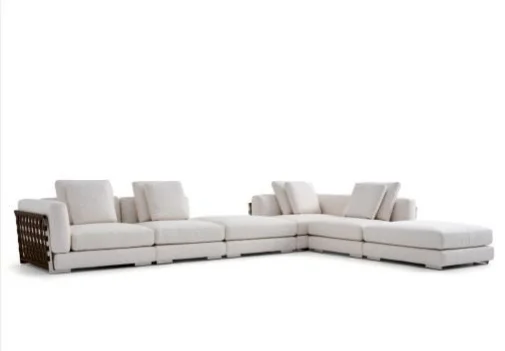 White sectional sofa with a projecting return and separate back cushions
