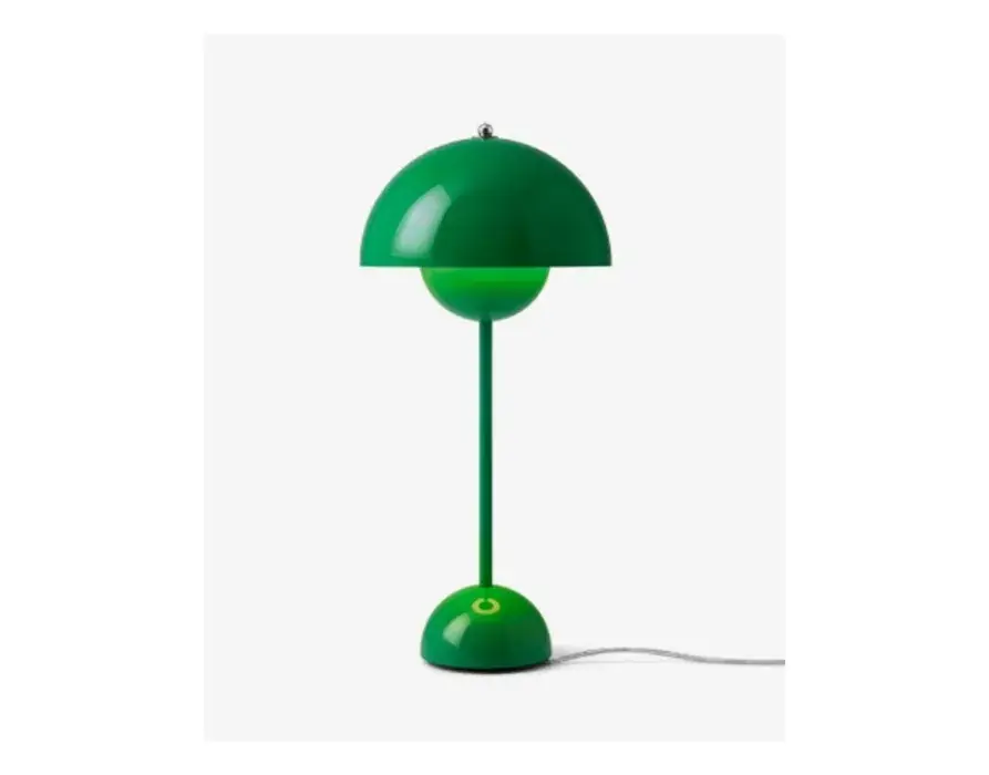 Green mushroom-shaped table lamp with a matching slender stem and round base