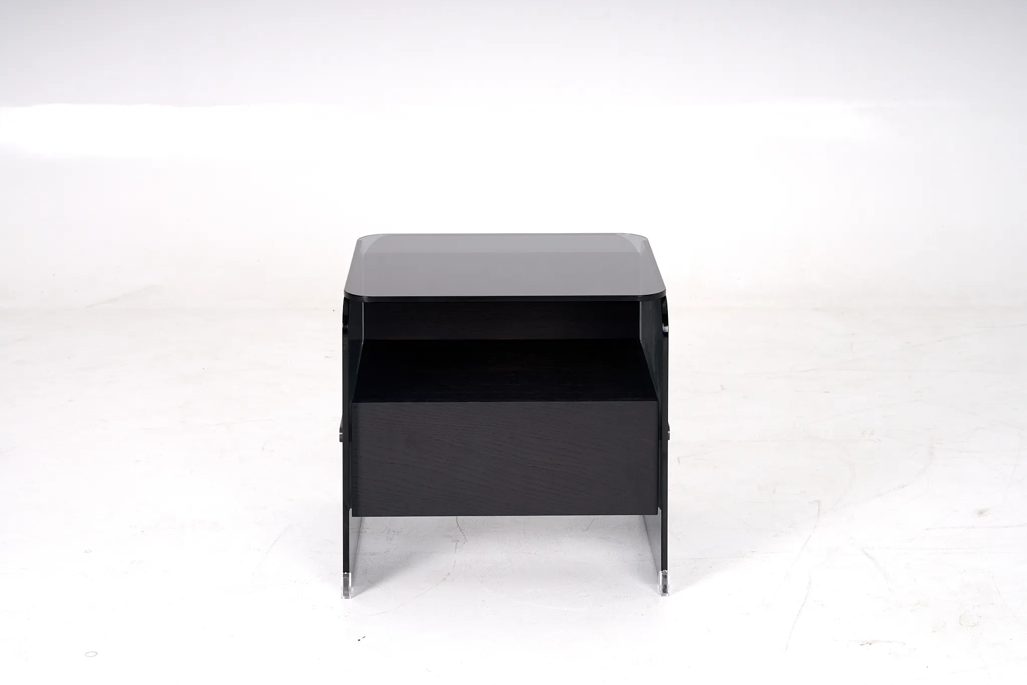 Dark bedside cabinet with a rectangular top, open shelf and lower storage front