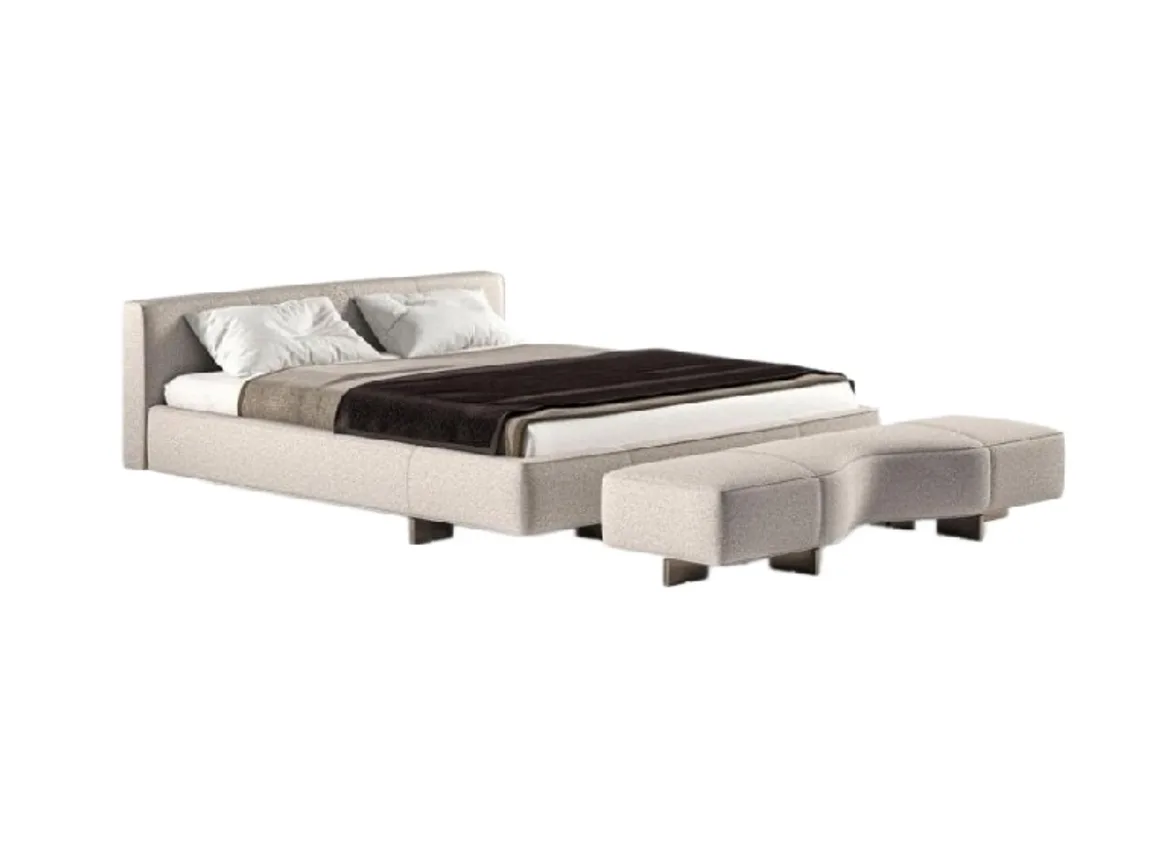 Beige upholstered bed with a padded headboard and a matching split end bench
