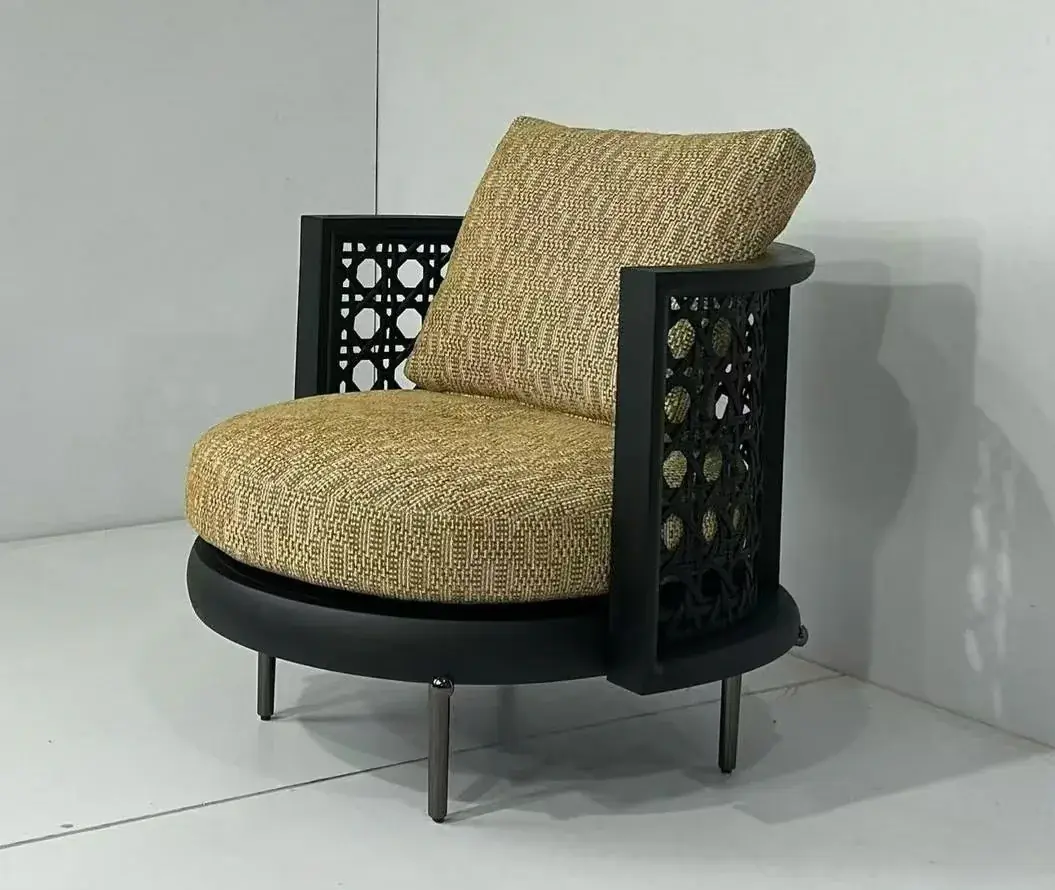 Carved wood accent chair with woven fabric upholstery